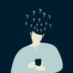 A person with question marks above his head. A person with question marks above his head.