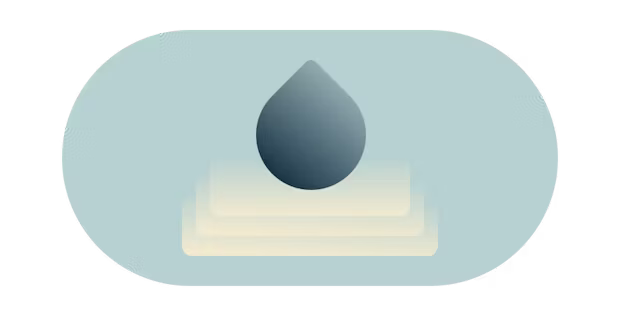 Water droplet creating ripples. 