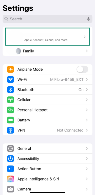 iPhone Settings screen with Apple ID option highlighted