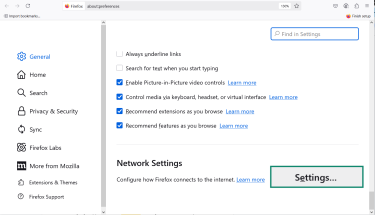 The Firefox Settings menu scrolled down to the bottom, with Network Settings highlighted.
