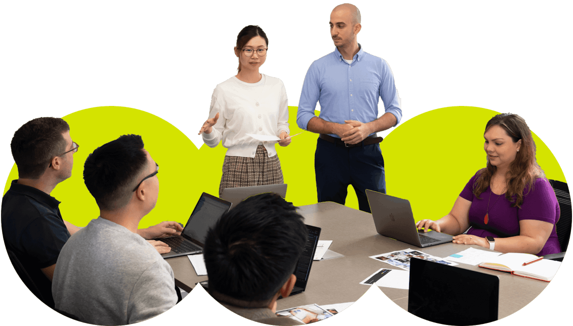 Employees at a meeting.